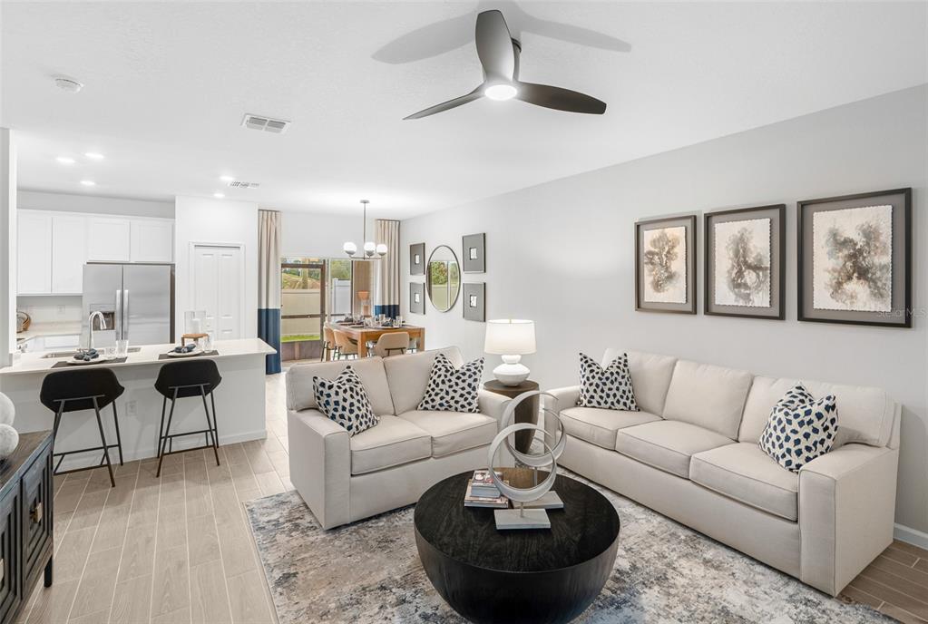 3639 Southeast 37th Ave Road Ocala, FL 34480 - Photo 27 of 61 a living room with furniture and a large window