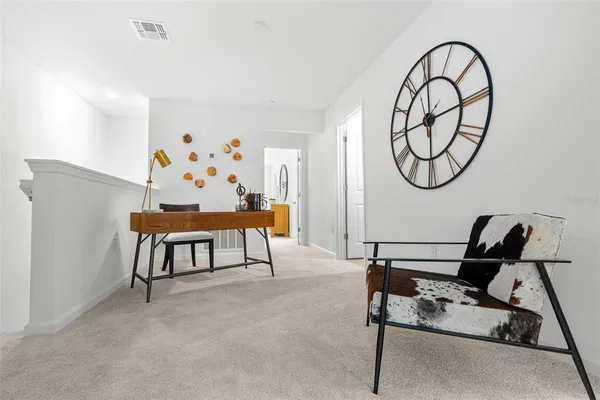 a bathroom with a granite countertop double vanity sinks and a mirror