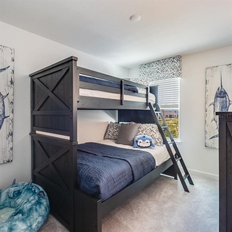 3639 Southeast 37th Ave Road Ocala, FL 34480 - Photo 51 of 61 a bedroom with a bed and a window