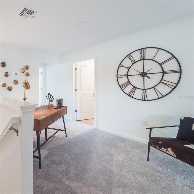 3639 Southeast 37th Ave Road Ocala, FL 34480 - Photo 54 of 61 a view of a livingroom with furniture and a potted plant