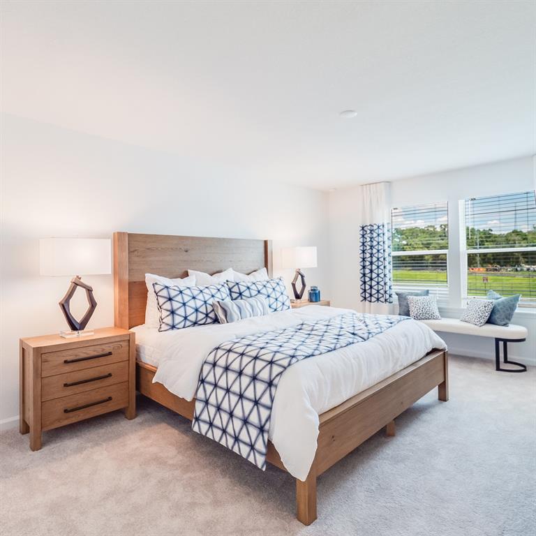 3639 Southeast 37th Ave Road Ocala, FL 34480 - Photo 56 of 61 a bedroom with a bed and window