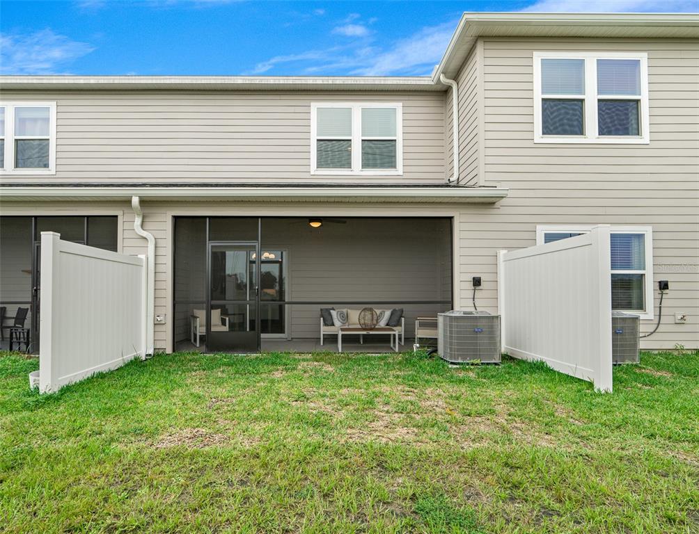 3639 Southeast 37th Ave Road Ocala, FL 34480 - Photo 7 of 61 a view of a house with a yard and sitting area