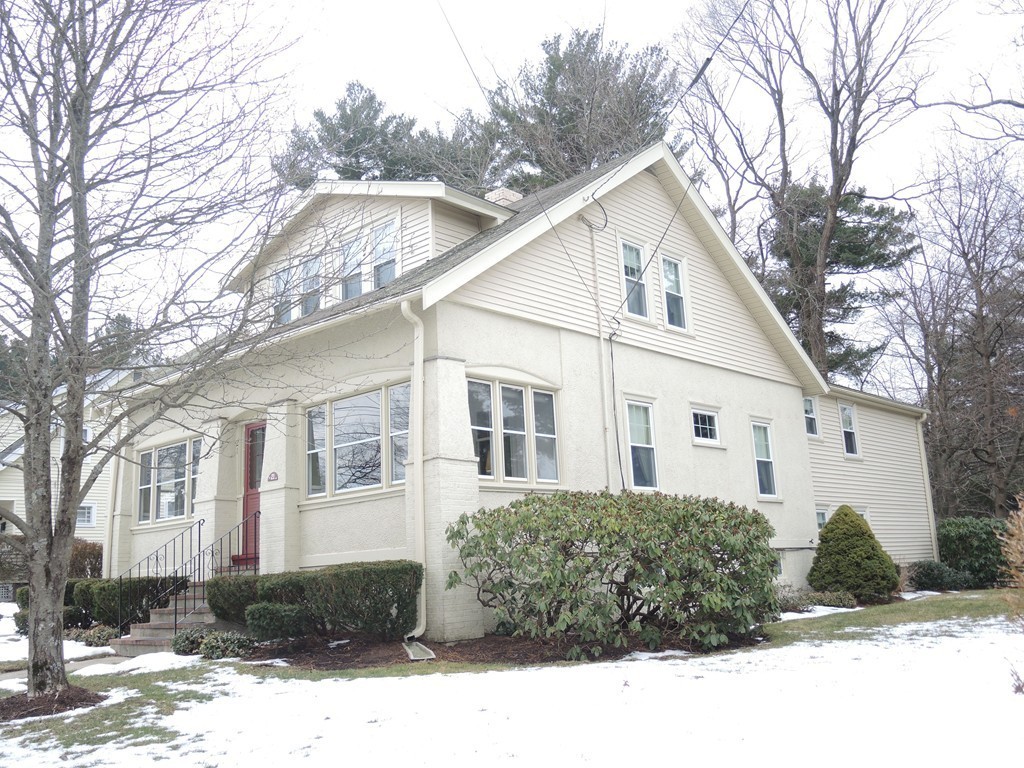 21 Lawton Road Needham, MA 02492 - Photo 3 of 28 a view of a white house with a yard