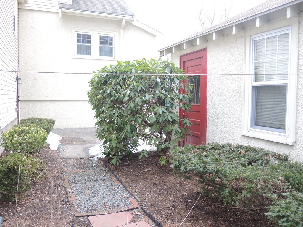 21 Lawton Road Needham, MA 02492 - Photo 4 of 28 a house view with a garden
