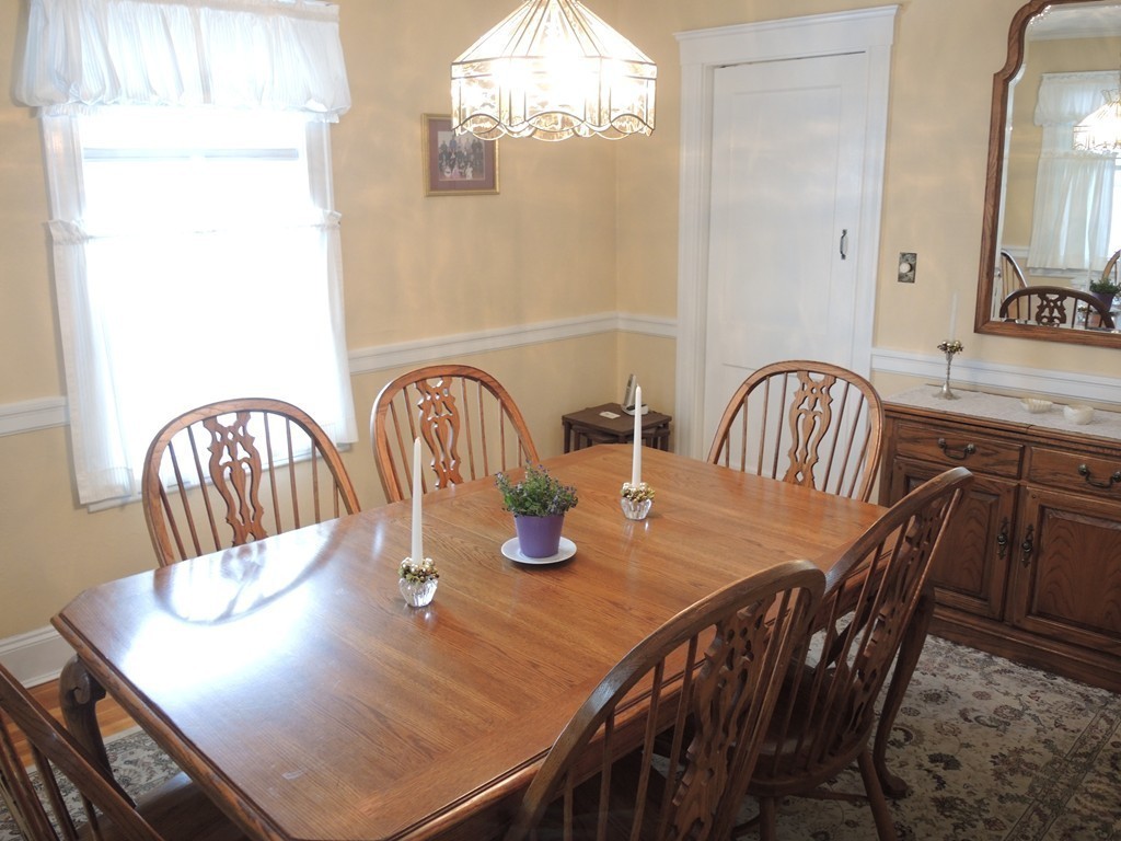 21 Lawton Road Needham, MA 02492 - Photo 10 of 28 a view of a dining room with furniture