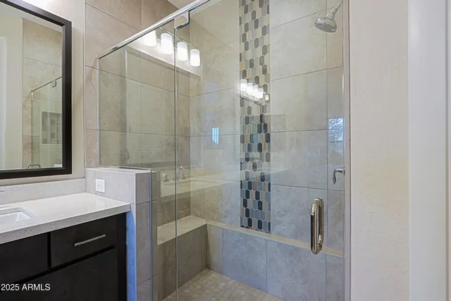 a bathroom with a bathtub and shower