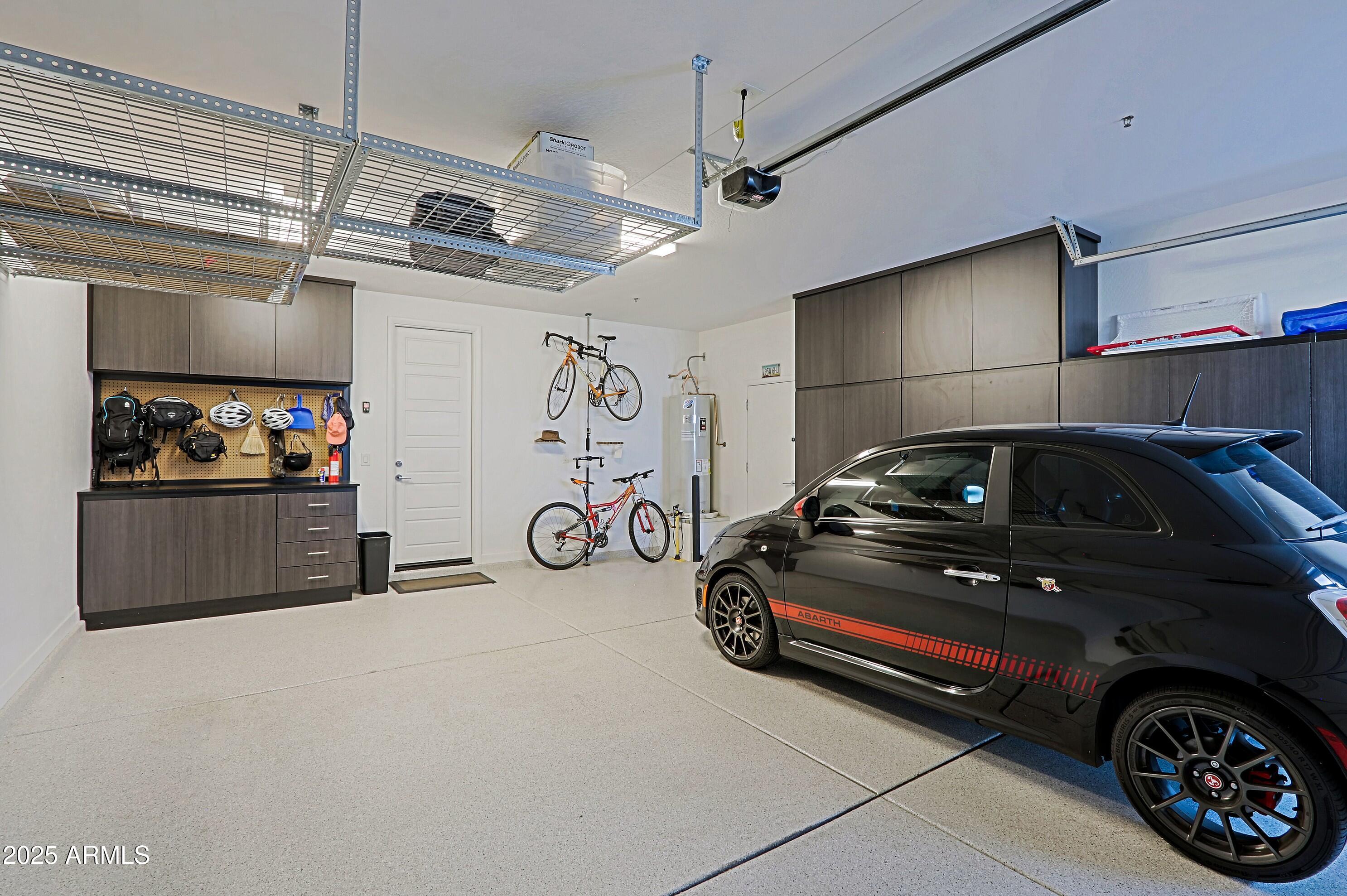 17811 East Cindercone Road Rio Verde, AZ 85263 - Photo 20 of 32 a car parked in a garage