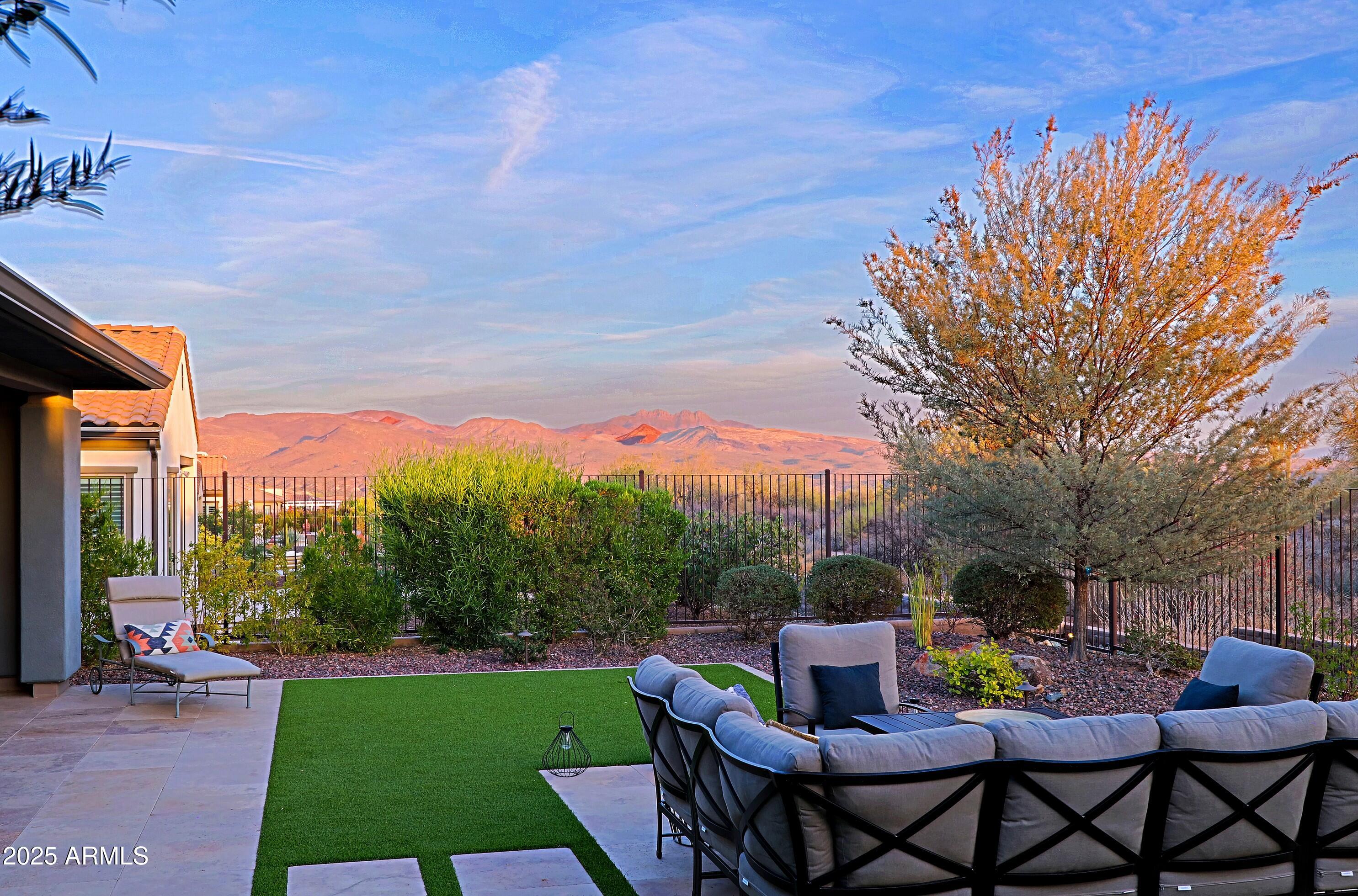 17811 East Cindercone Road Rio Verde, AZ 85263 - Photo 21 of 32 a view of a tables and chairs in patio