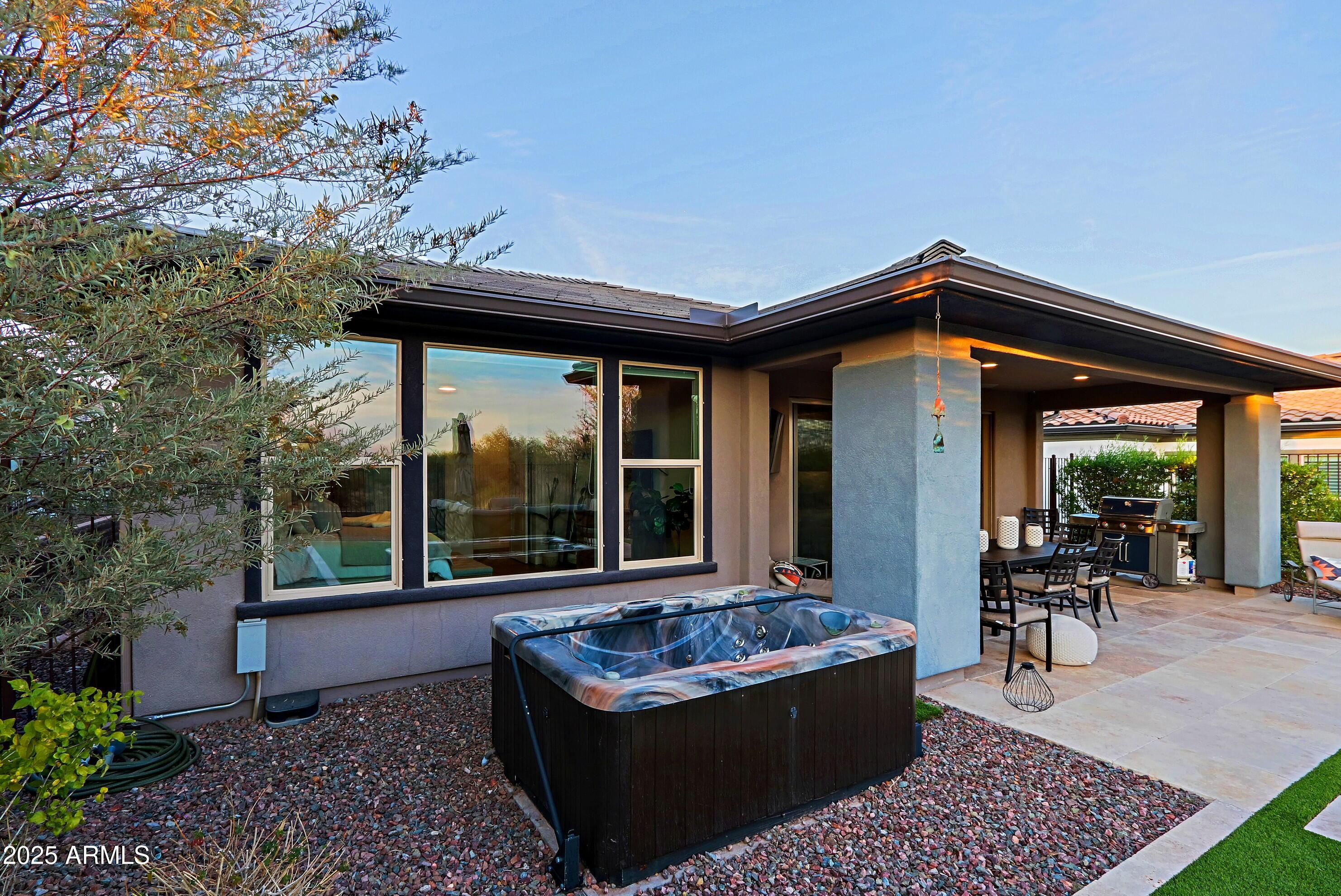 17811 East Cindercone Road Rio Verde, AZ 85263 - Photo 22 of 32 a view of a chairs and table in a patio