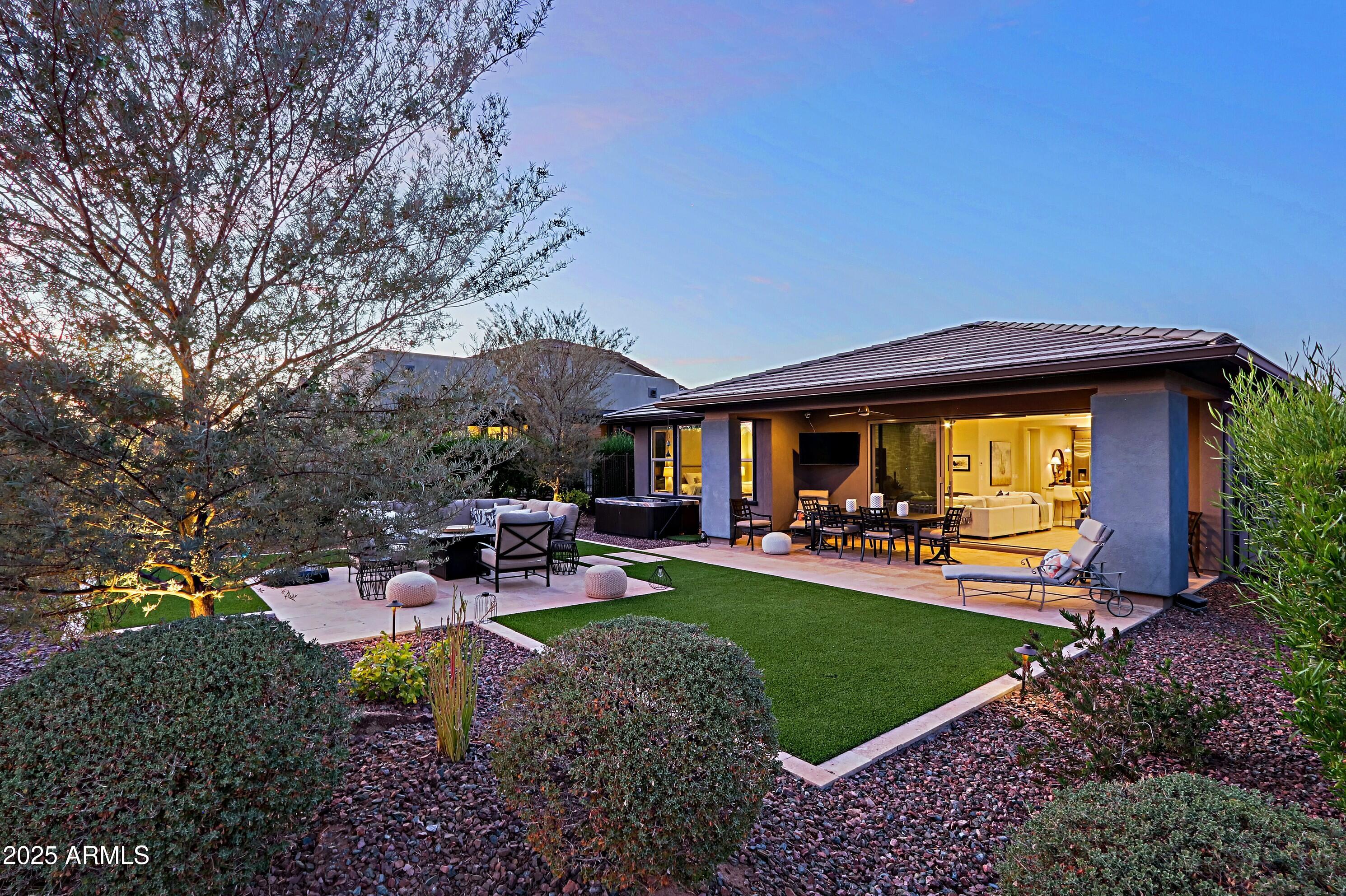 17811 East Cindercone Road Rio Verde, AZ 85263 - Photo 28 of 32 a view of a house with backyard porch and sitting area