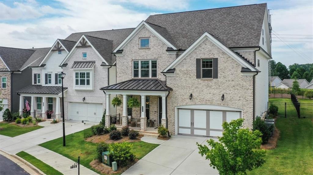 730 Armstead Terrace Alpharetta, GA 30004 - Photo 1 of 1 a front view of a house with garden