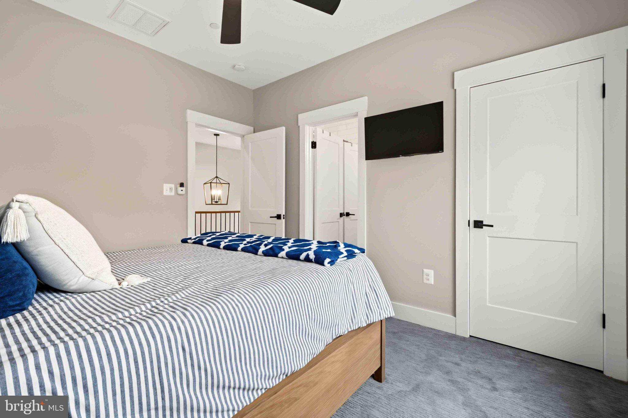 138 Ridge Run Road McHenry, MD 21541 - Photo 52 of 84 Serene bedroom with modern touches.