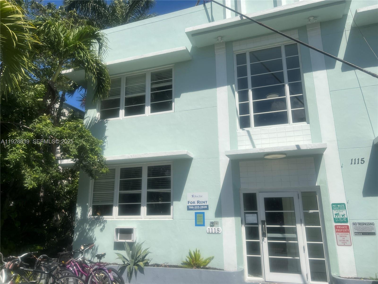 1115 Euclid Avenue, Unit 2 Miami Beach, FL 33139 - Photo 1 of 11 a front view of a house with a yard