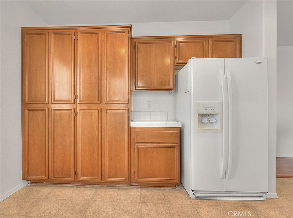 8150 West Preserve Loop Chino, CA 91708 - Photo 23 of 51 a white refrigerator freezer sitting in a kitchen