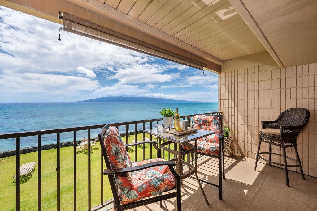3785 Lower Honoapiilani Road, Unit 208 Lahaina, HI 96761 - Photo 3 of 50 a view of a chairs and table in the balcony