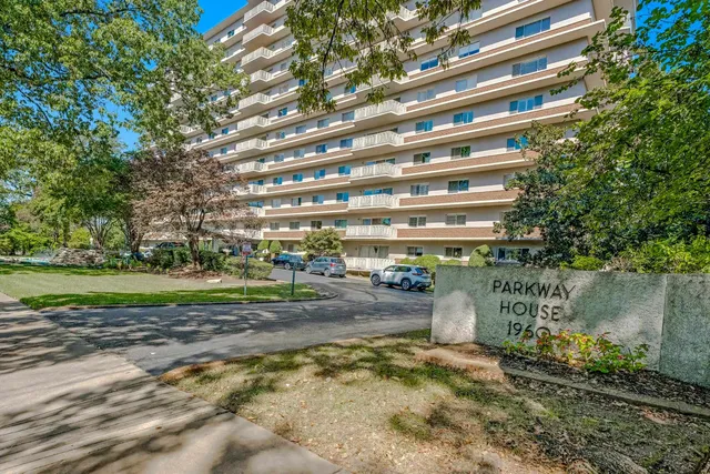 a view of a building with a garden