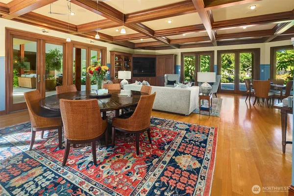 a view of a dining room with furniture window and outside view