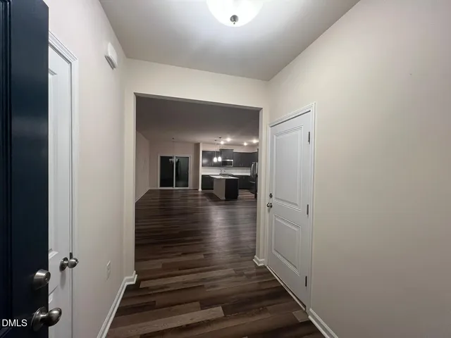 a view of a hallway view with staircase