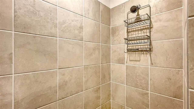 a view of a lake with houses in the back