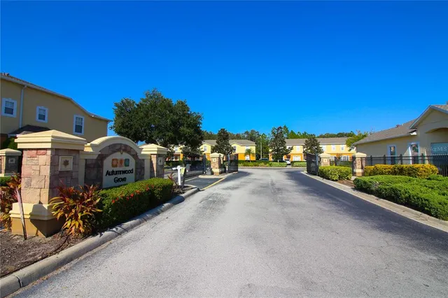 a view of multiple houses with a street