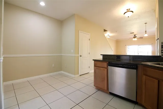 an empty room with wooden floor