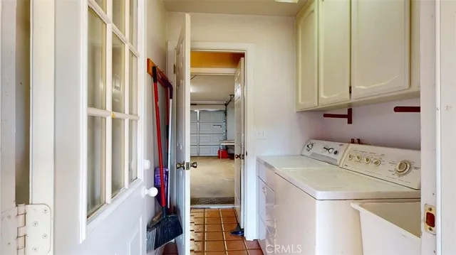 a bathroom with a sink toilet and a mirror