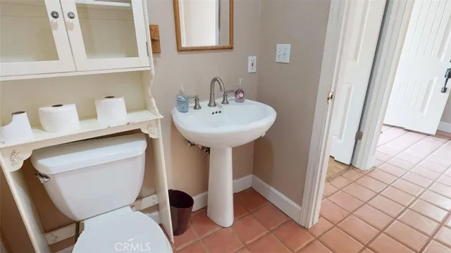 a view of kitchen with furniture and a window