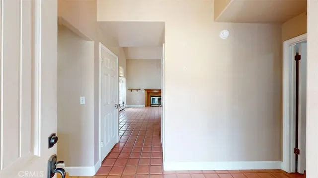 a view of a bathroom from a hallway