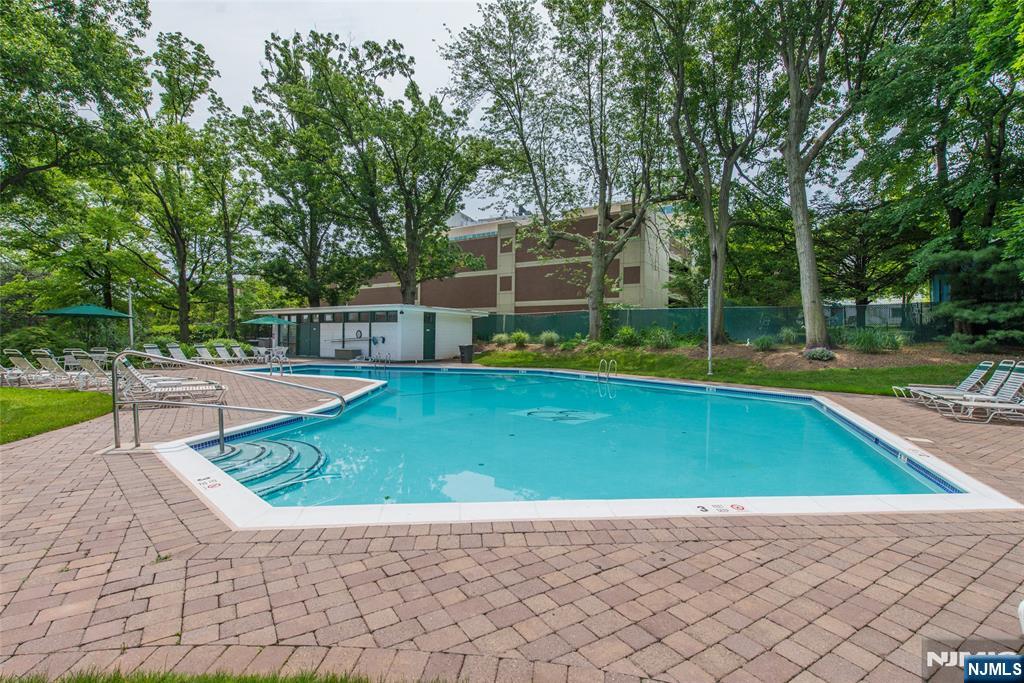 301 Beech Street, Unit 3K Hackensack, NJ 07601 - Photo 11 of 29 a view of a backyard with swimming pool