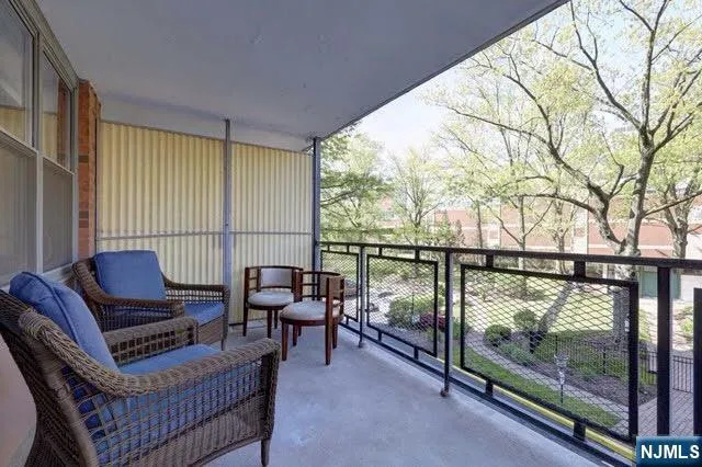 a living room with furniture and a gate