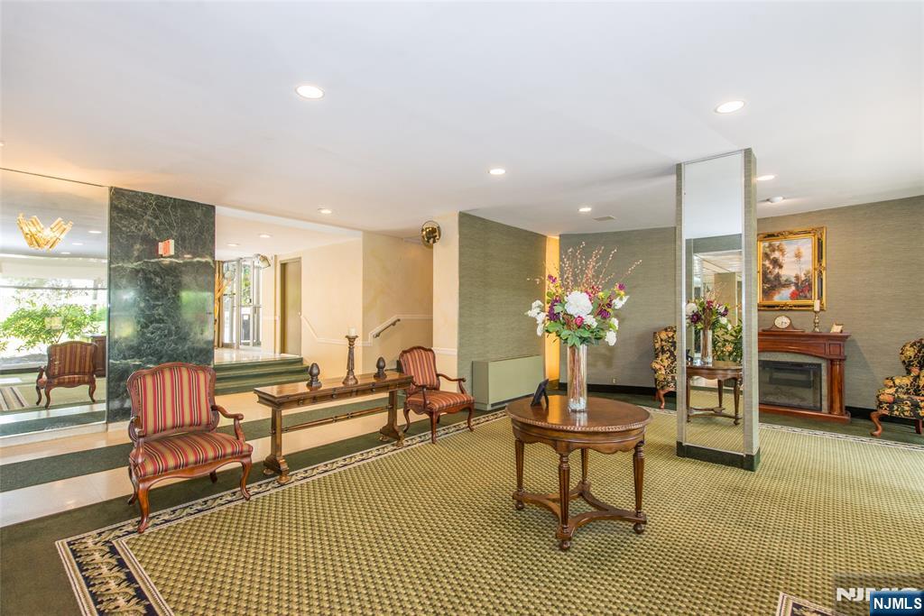 301 Beech Street, Unit 3K Hackensack, NJ 07601 - Photo 7 of 29 a living room with furniture