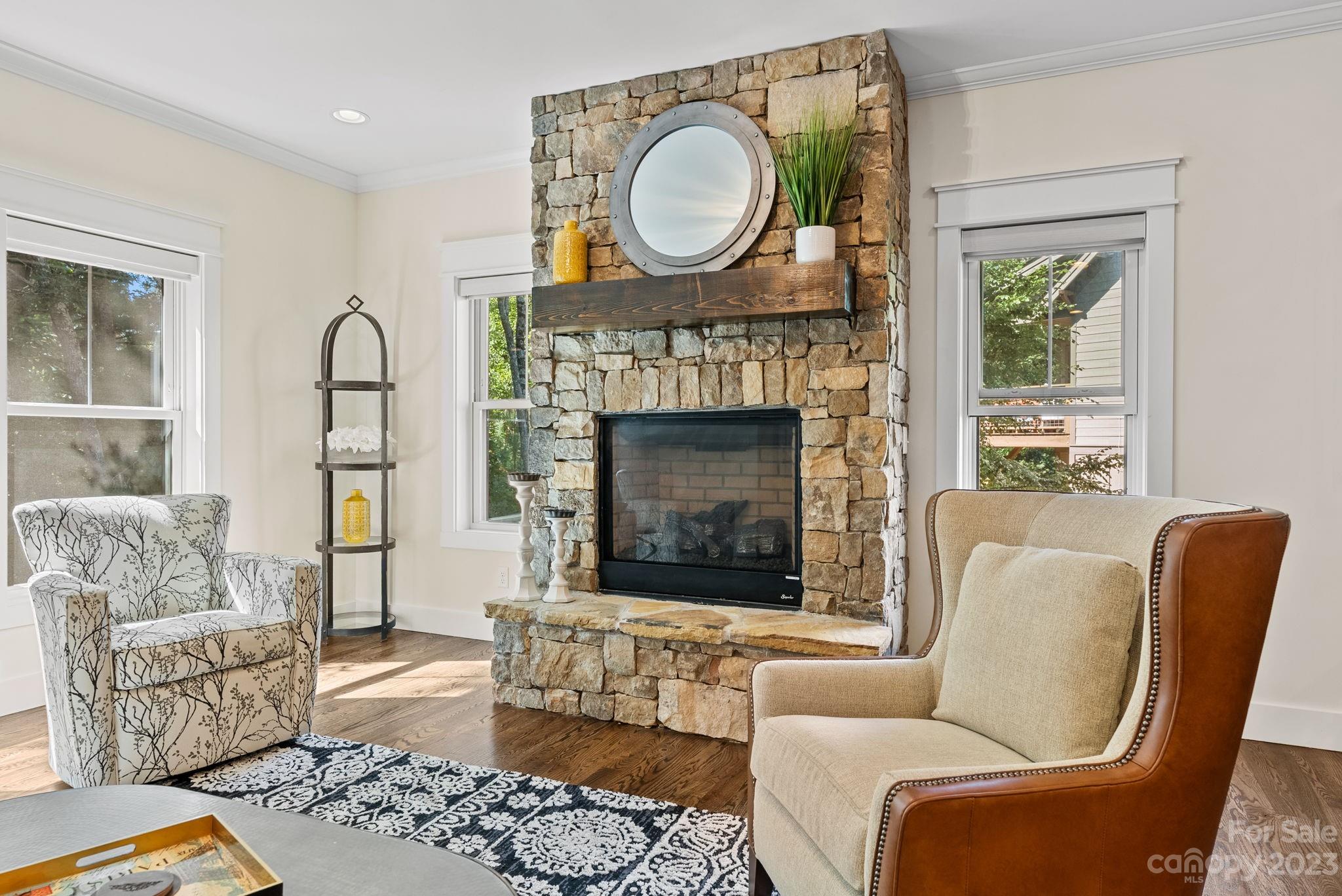 37 Still Creek Loop Fairview, NC 28730 - Photo 14 of 46 a living room with furniture and a fireplace