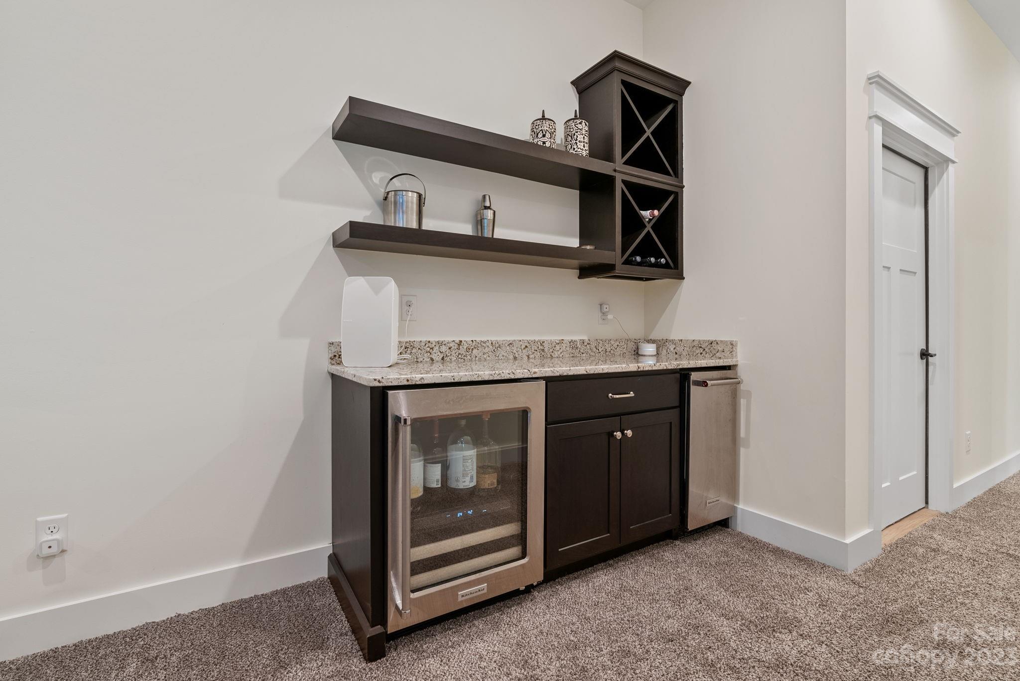 37 Still Creek Loop Fairview, NC 28730 - Photo 26 of 46 a kitchen with stainless steel appliances granite countertop a stove and a microwave