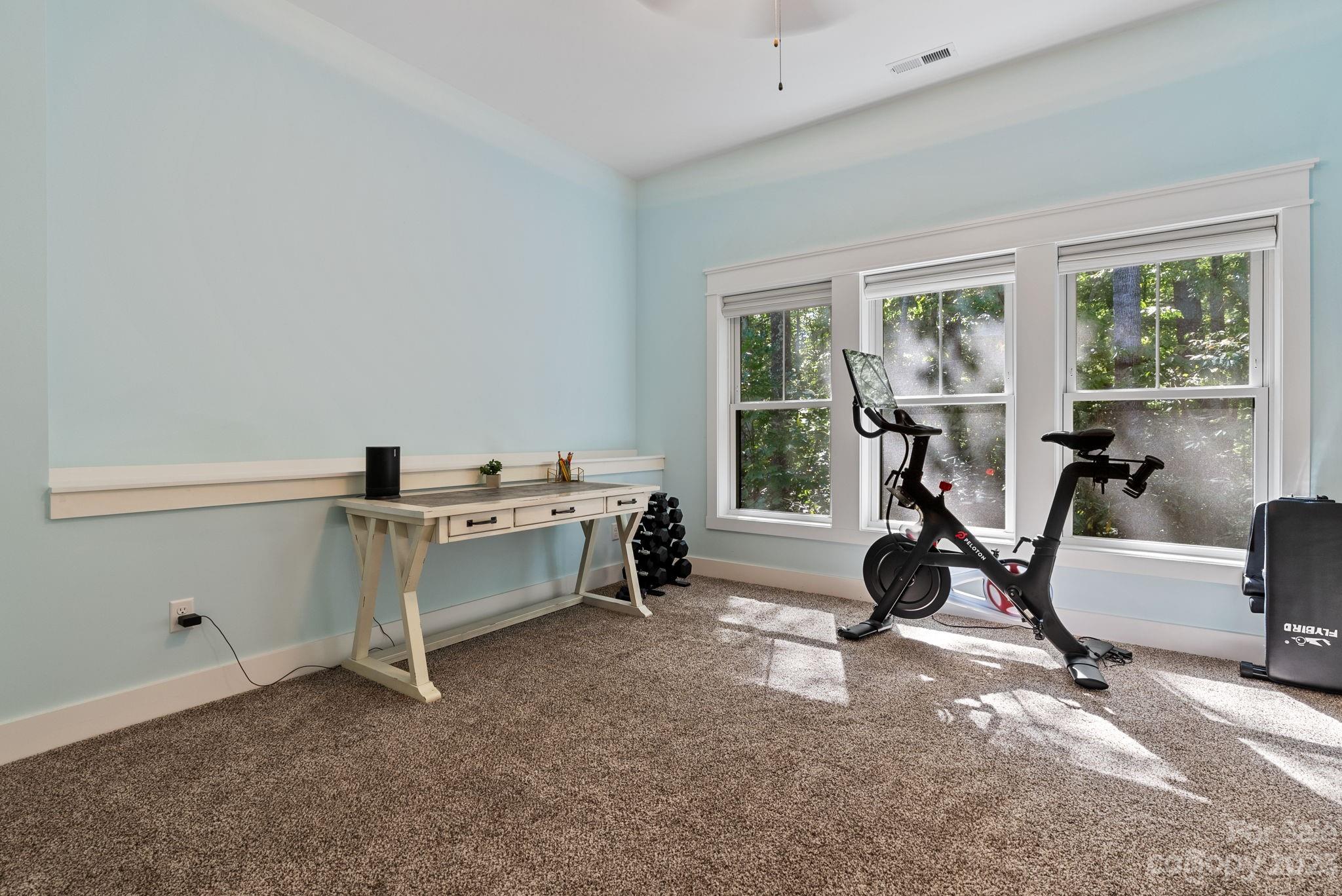 37 Still Creek Loop Fairview, NC 28730 - Photo 28 of 46 a view of a workspace with furniture and a window
