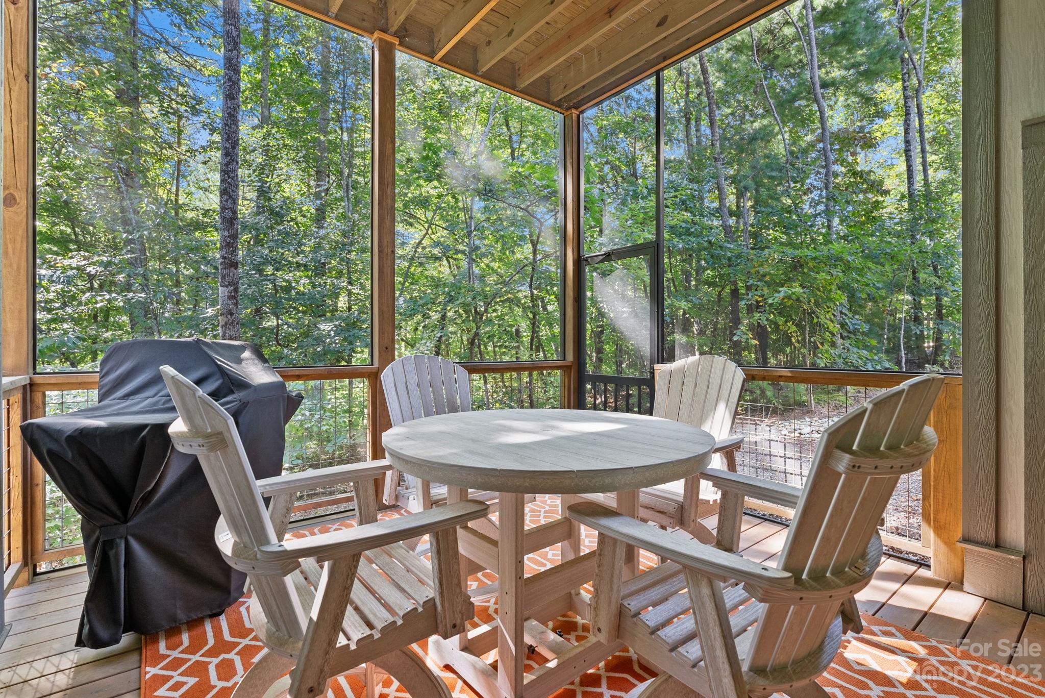 37 Still Creek Loop Fairview, NC 28730 - Photo 31 of 46 a view of a patio with a table chairs and a table