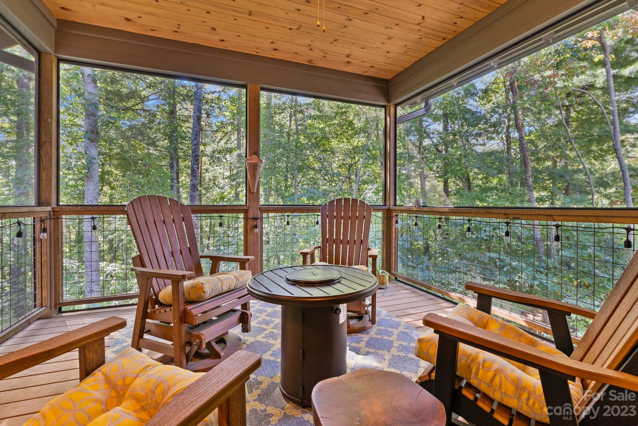 37 Still Creek Loop Fairview, NC 28730 - Photo 32 of 46 a living room with large windows