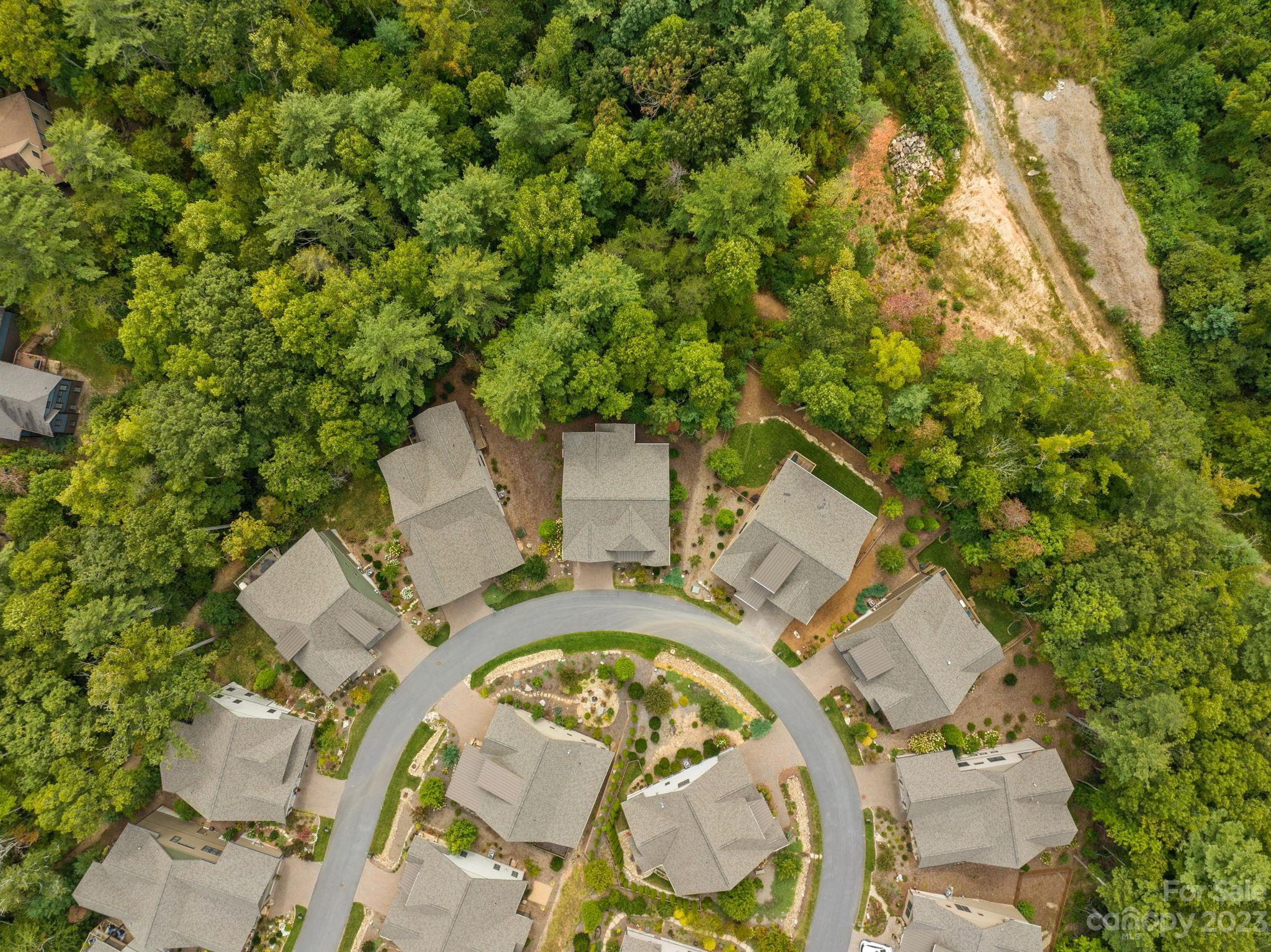 37 Still Creek Loop Fairview, NC 28730 - Photo 38 of 46 an aerial view of a house with swimming pool and outdoor space