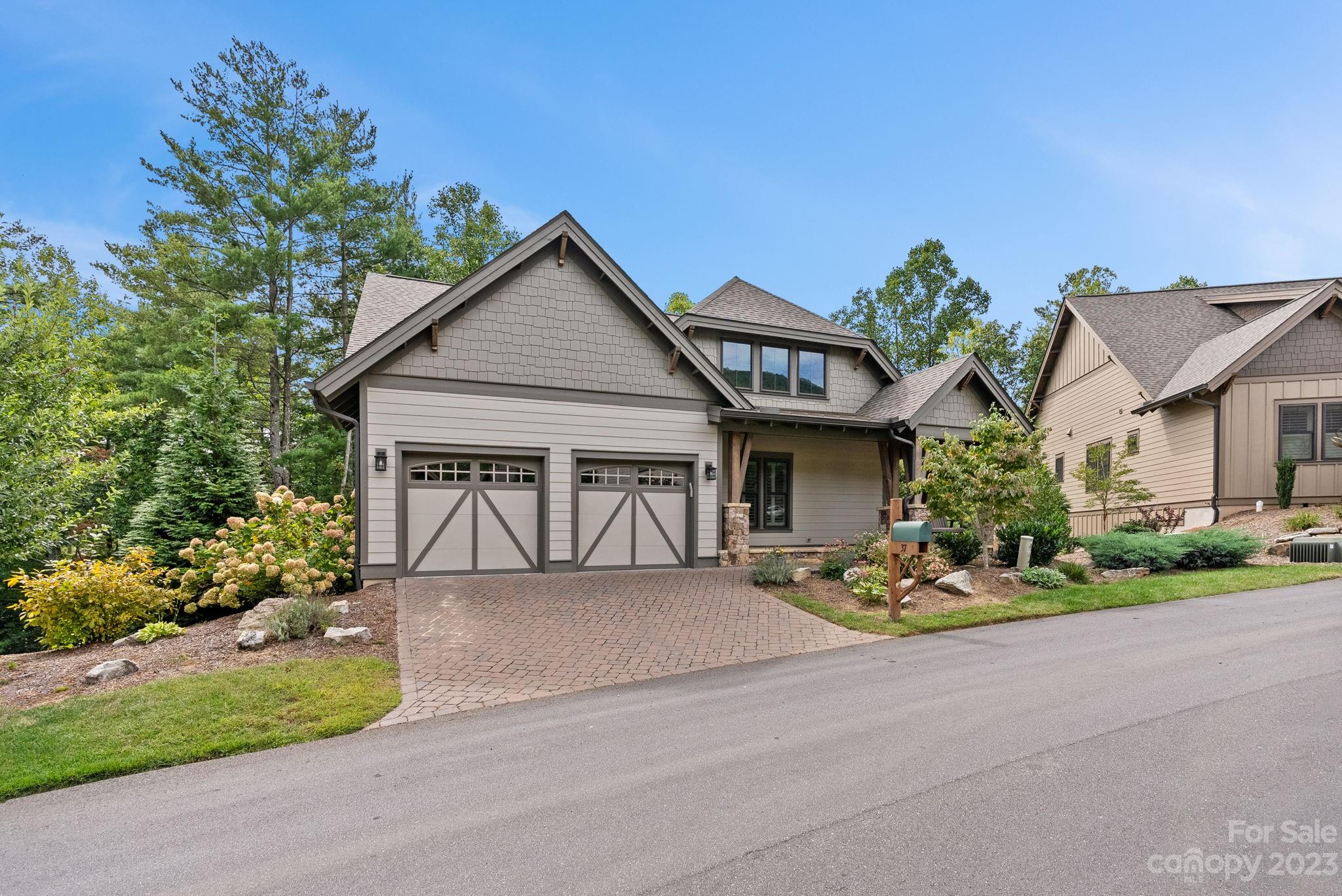 37 Still Creek Loop Fairview, NC 28730 - Photo 46 of 46 front view of house with a yard and potted plants