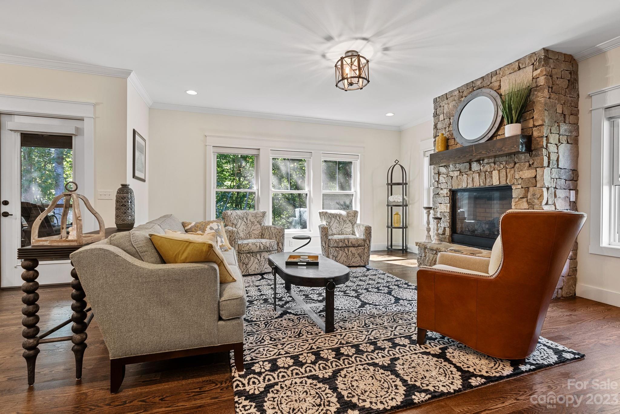 37 Still Creek Loop Fairview, NC 28730 - Photo 7 of 46 a living room with furniture and a fireplace