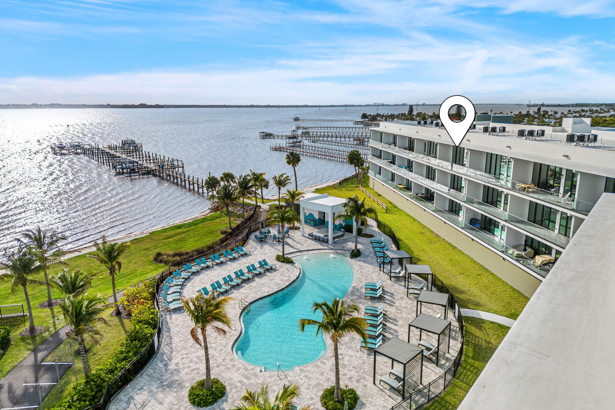 225 Strand Drive, Unit 404 Melbourne Beach, FL 32951 - Photo 1 of 30 a view of a city with an ocean view