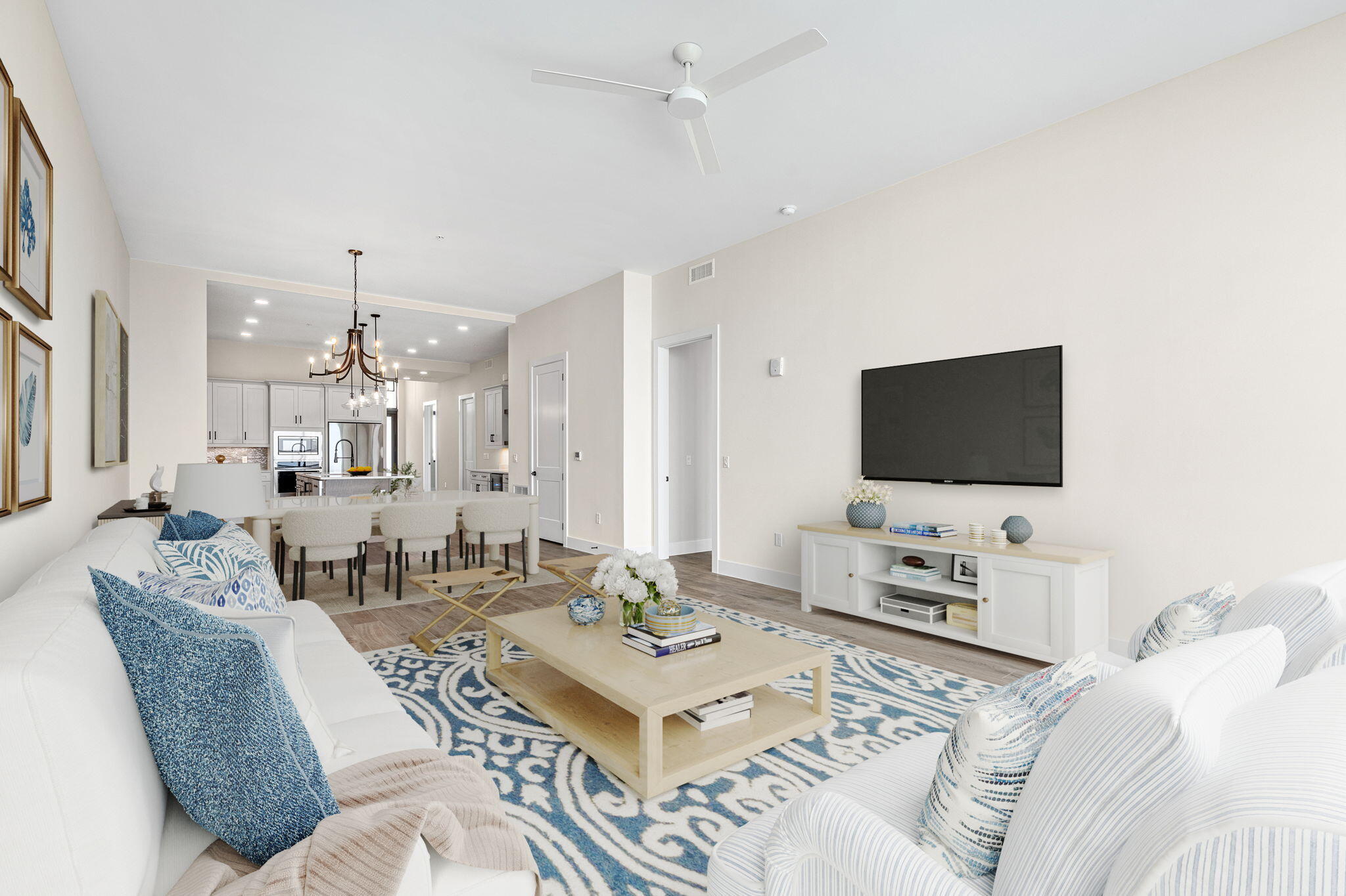 225 Strand Drive, Unit 404 Melbourne Beach, FL 32951 - Photo 11 of 30 a living room with furniture and a flat screen tv