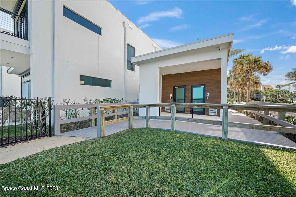 225 Strand Drive, Unit 404 Melbourne Beach, FL 32951 - Photo 29 of 30 a view of a living room and deck