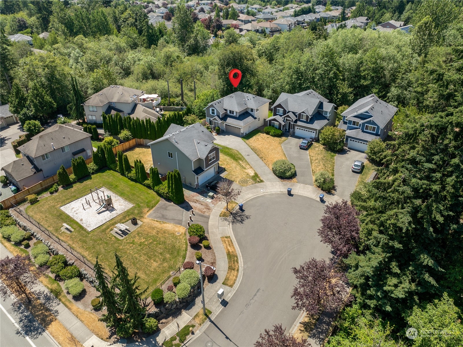 3426 172nd Place Southeast Bothell, WA 98012 - Photo 28 of 33 an aerial view of a house with a yard and lake view