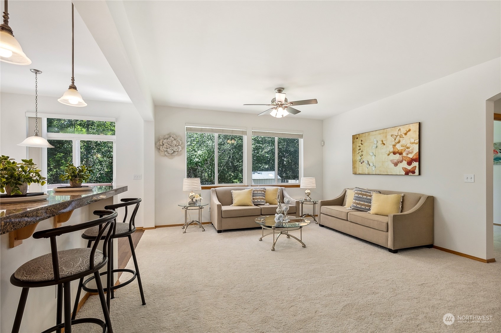 3426 172nd Place Southeast Bothell, WA 98012 - Photo 3 of 33 a living room with furniture and a large window