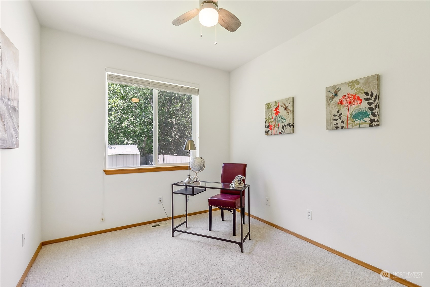 3426 172nd Place Southeast Bothell, WA 98012 - Photo 7 of 33 a living room with furniture and a window