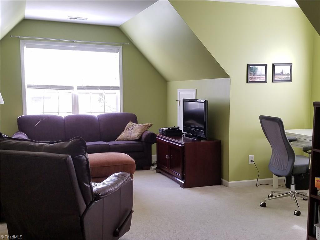 7822 Wilson Farm Road Summerfield, NC 27358 - Photo 25 of 30 Bonus room with nice area for office desk. Plenty of attic space for storage