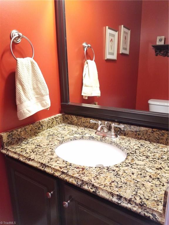 7822 Wilson Farm Road Summerfield, NC 27358 - Photo 28 of 30 Half bath on main level