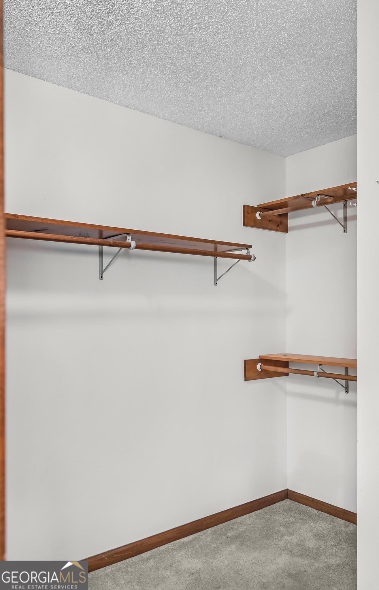 4909 Perry Road Claxton, GA 30417 - Photo 31 of 54 a view of a room with racks on the wall