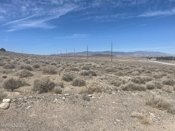 a view of a field with an outdoor space