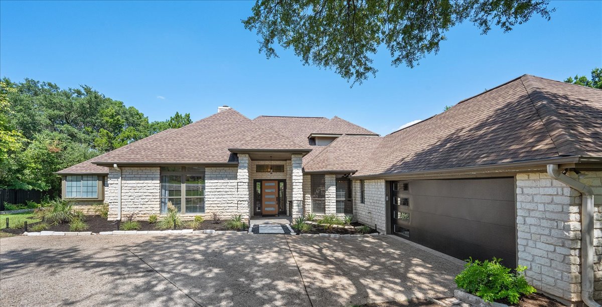 105 Rupen Drive Lakeway, TX 78734 - Photo 1 of 1 a view of a house with a patio